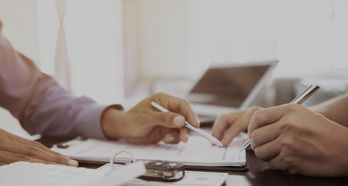 Closeup of people at a desk